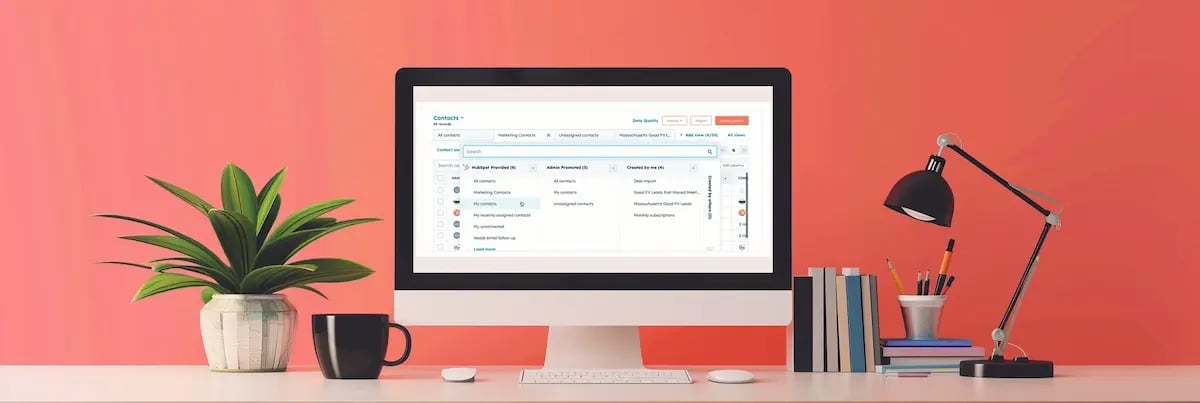 tidy computer with hubspot on screen in peach room