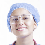 headshot of a woman in a nurse uniform