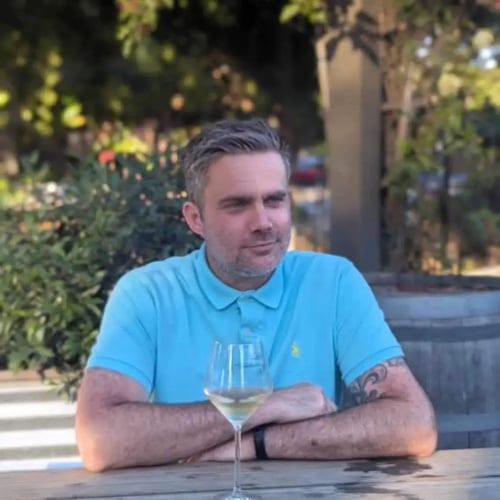 Will Davidson sitting at a table