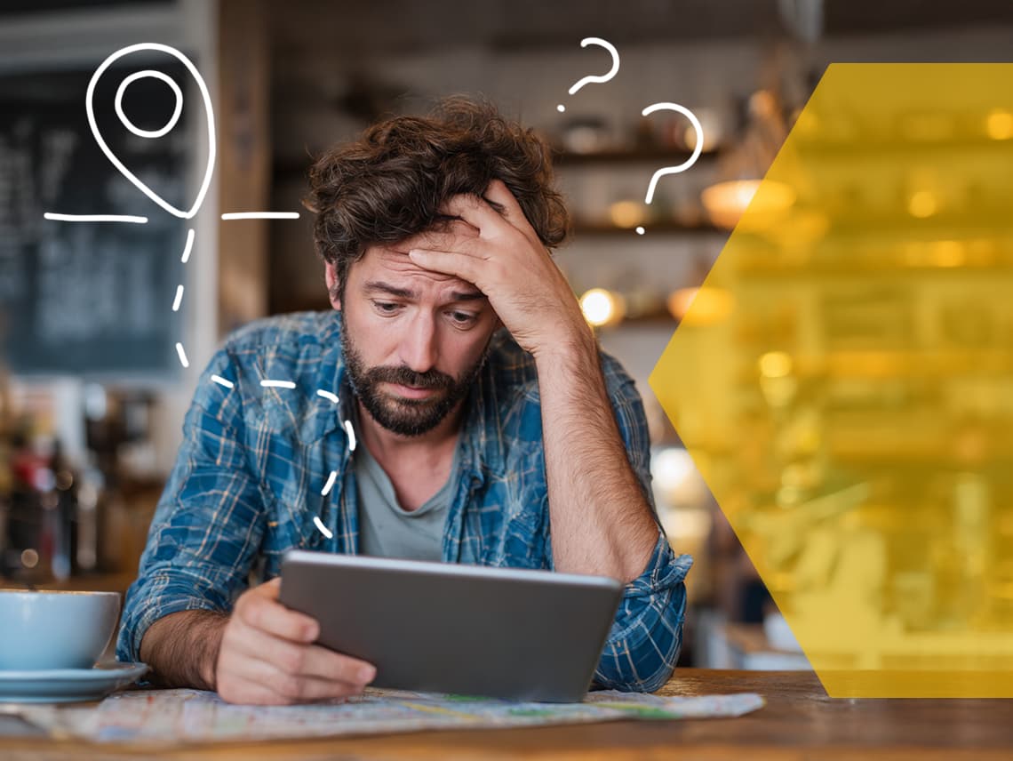 a man looking at a tablet with a frustrated expression. an icon representing local search appears around his head, next to question marks.